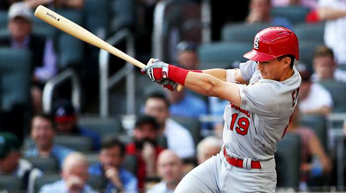 Oct 9, 2019; Atlanta, GA, USA;St. Louis Cardinals right fielder Tommy Edman (19) hits an RBI double against the Atlanta Braves in the first inning of game five of the 2019 NLDS playoff baseball series at SunTrust Park. Mandatory Credit: Brett Davis-USA TODAY Sports